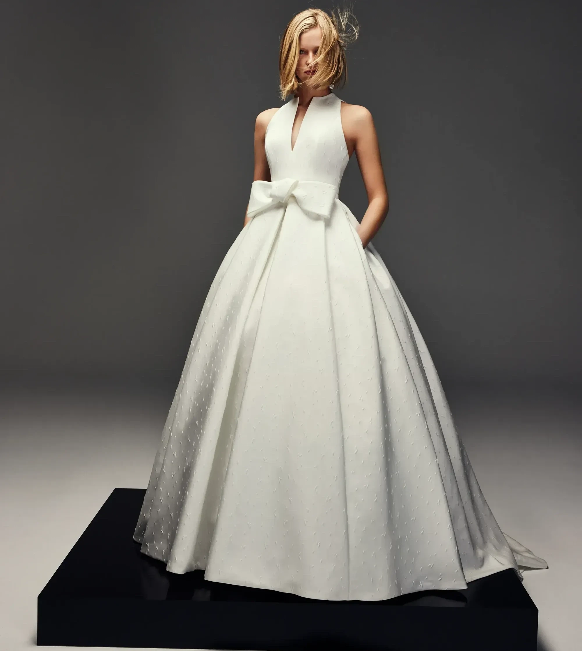 Model wearing a Jesus Peiro gown