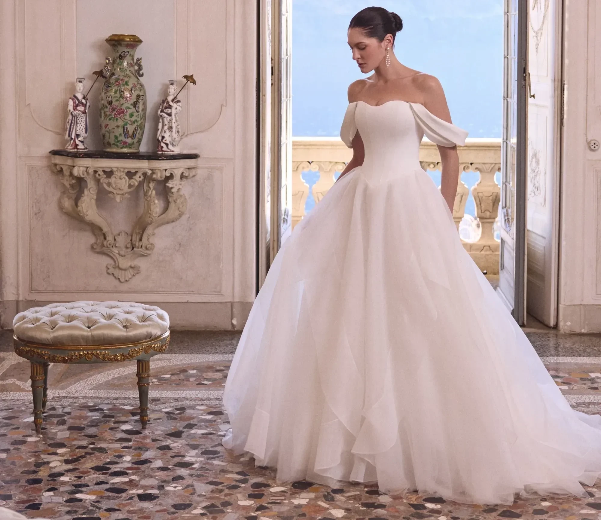 Model wearing a Justin Alexander gown