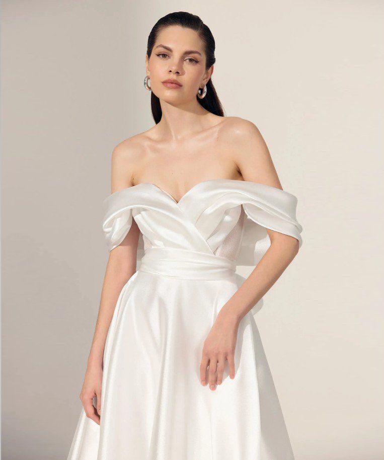 Model wearing an Ariamo gown