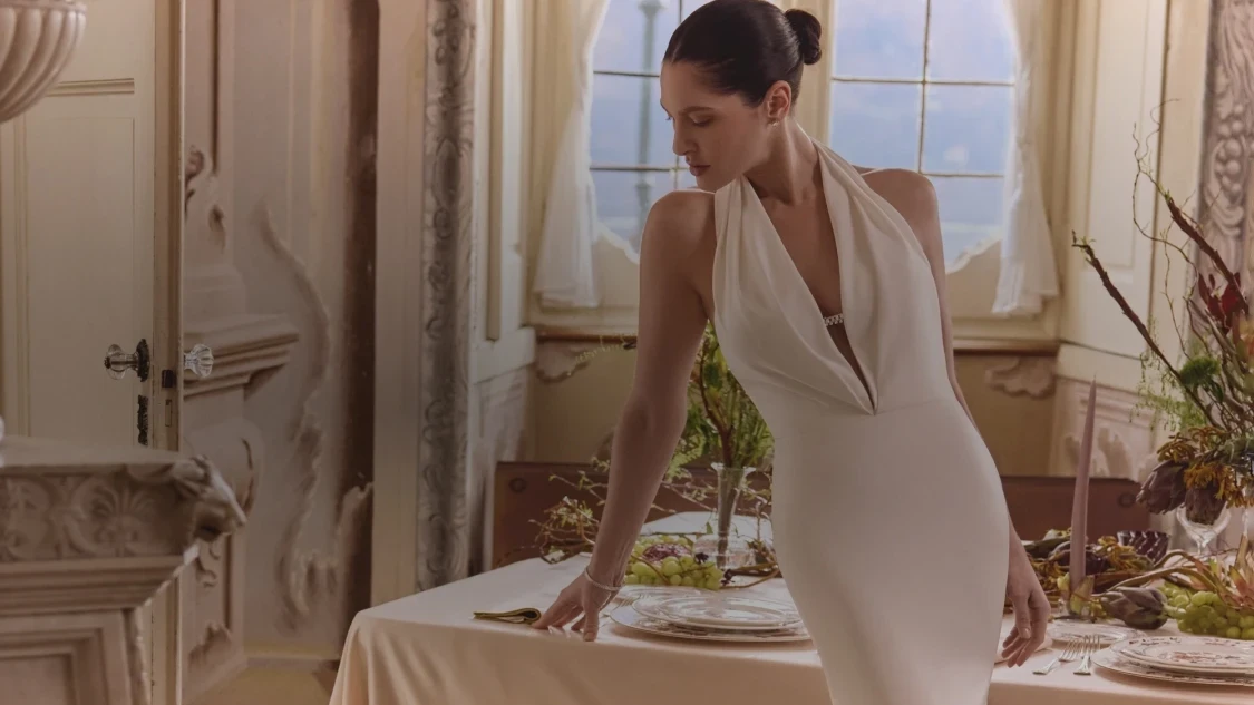 Model wearing Justin Alexander Spring 2026 bridal dress, mobile banner